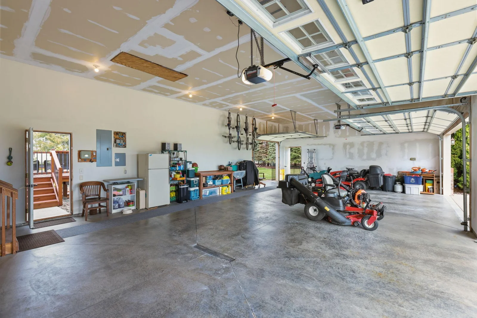 A dream garage w/extra over-head door
