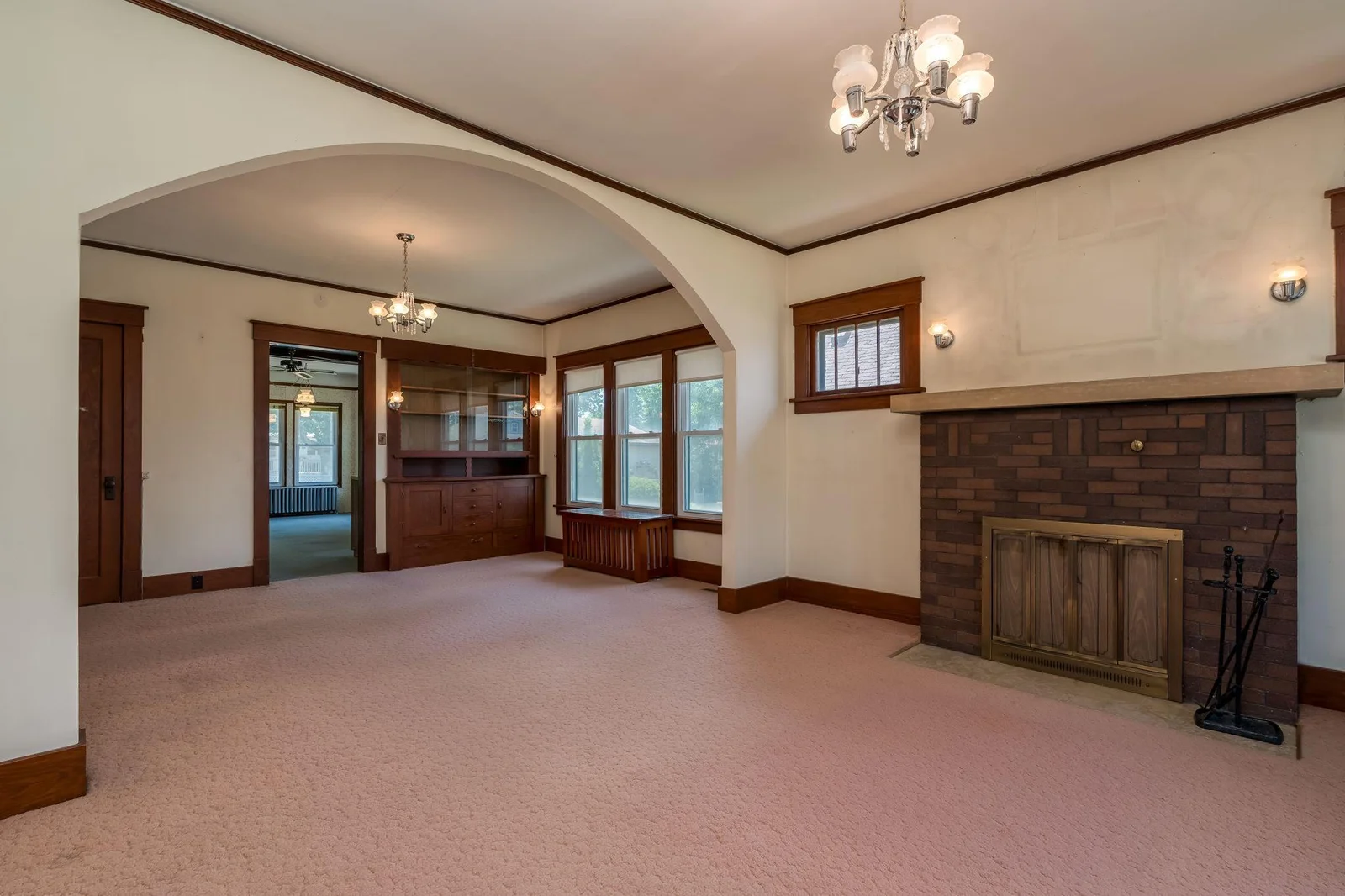 Beautiful  original hardwoods are below the carpet