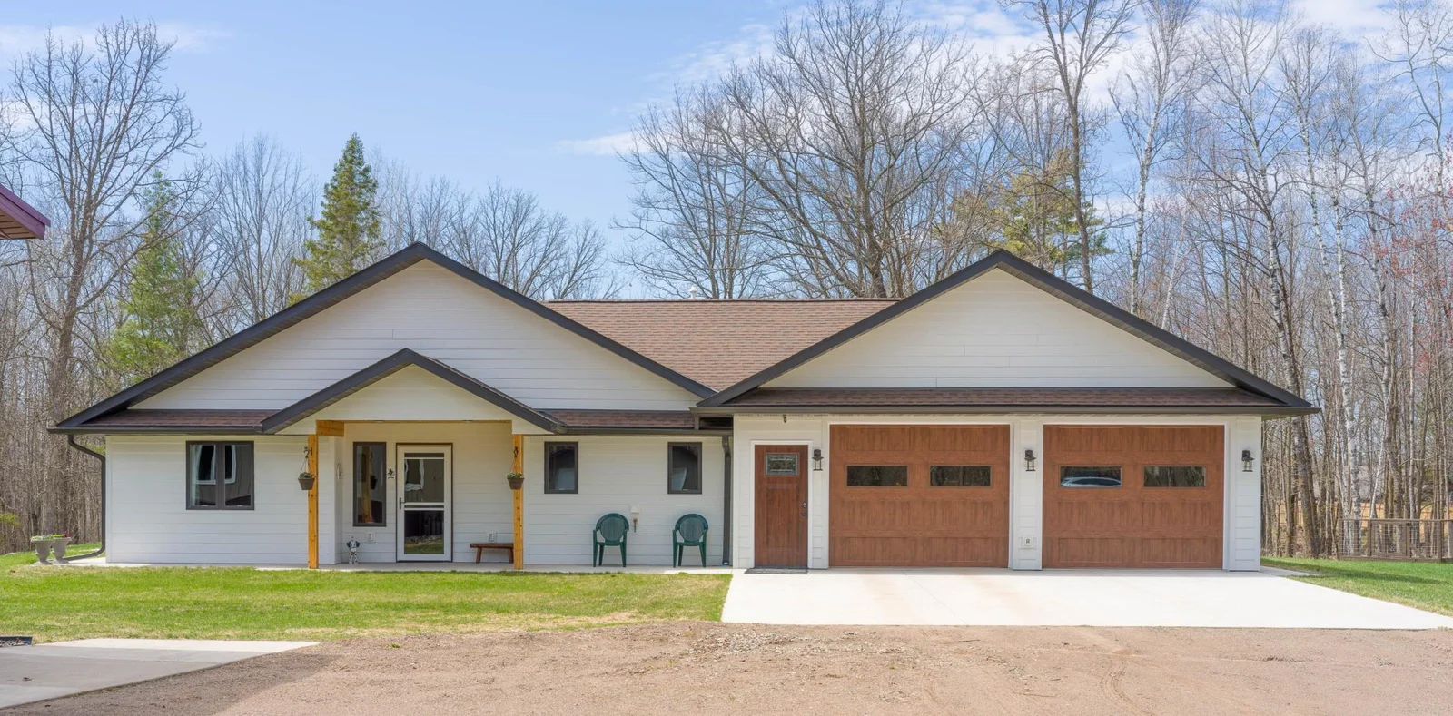 Diamond Kote LP Smart Siding, Perimeter Concrete sidewalks, and Large Garage Apron
