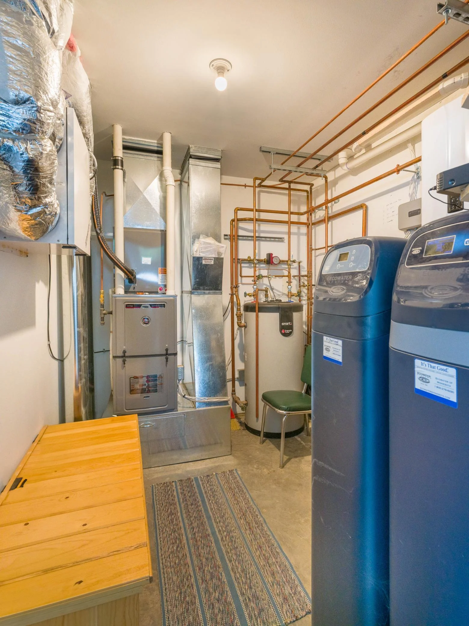 Forced Air Furnace with A/C.  5 in-floor heat zones for separate heat control for Bathrooms and Bedrooms—hot Water Recirculation for quick Hot Water to the Kitchen Sink.  Water Filtration System, Water Osmosis System, and Water Softener.