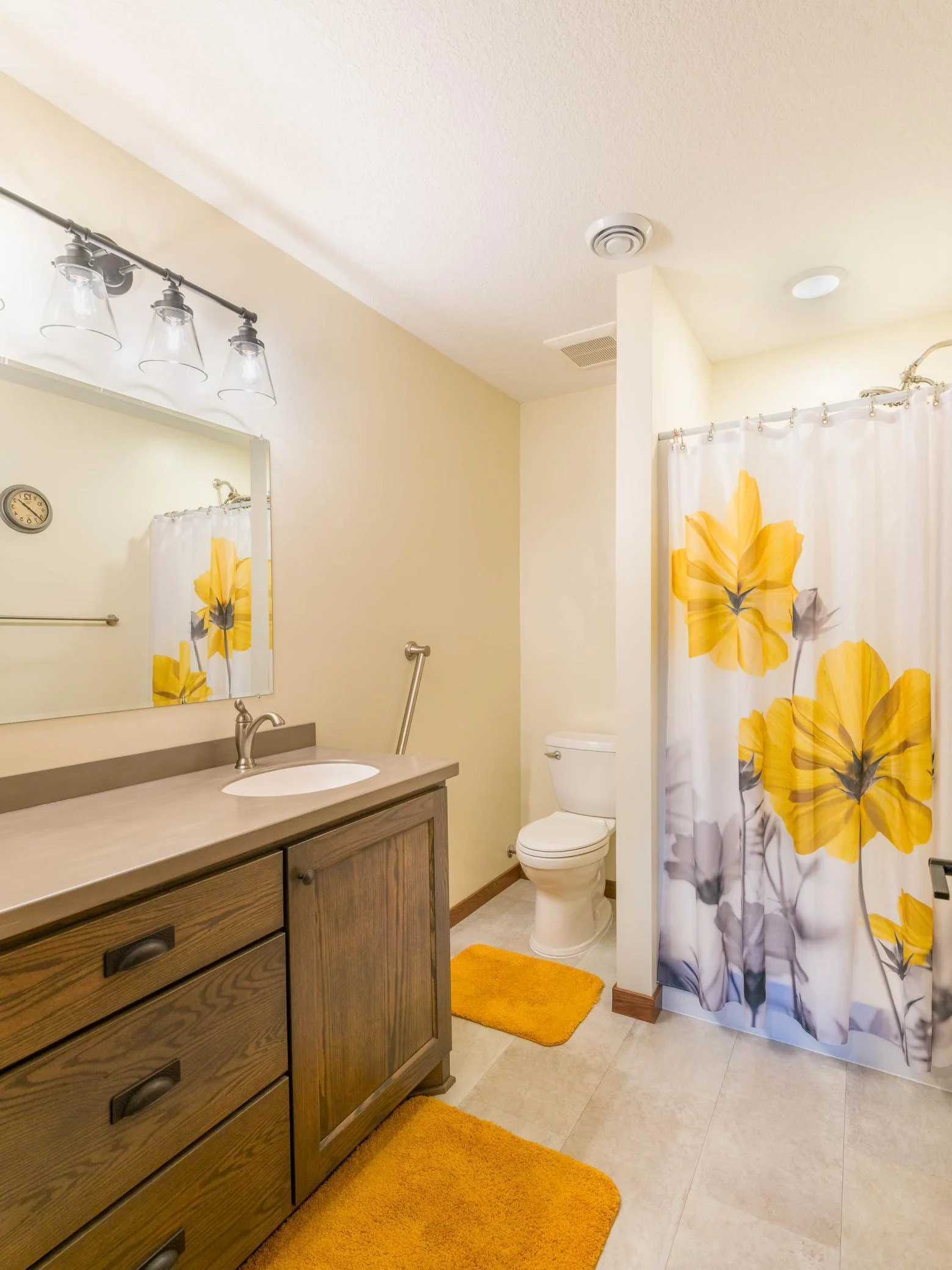 3/4 bathroom off of hallway to the garage.