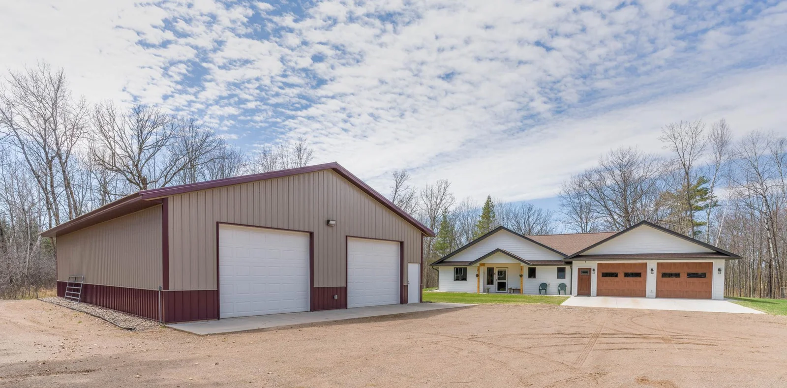 40 x 56 building has Heated Workshop (3) - 12 × 10 Ft Garage Doors (2 with openers)