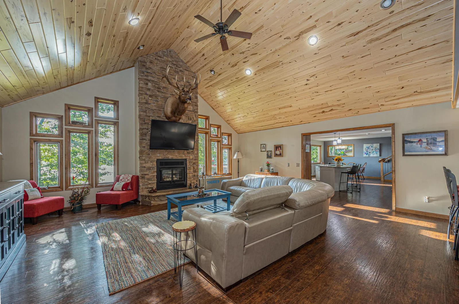 Towering great room with floor to ceiling fireplace.