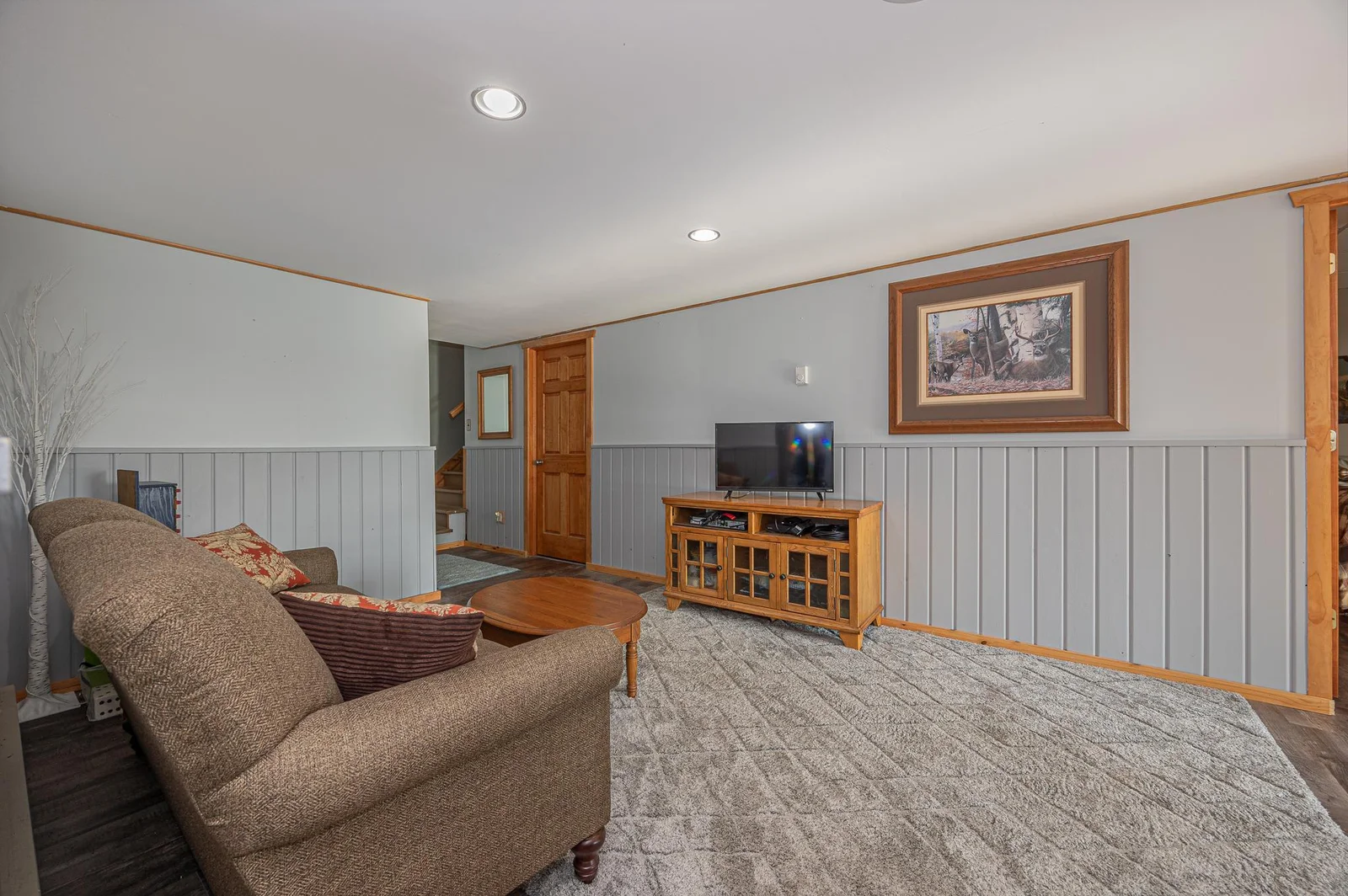 Additional views of lower level entertainment space.