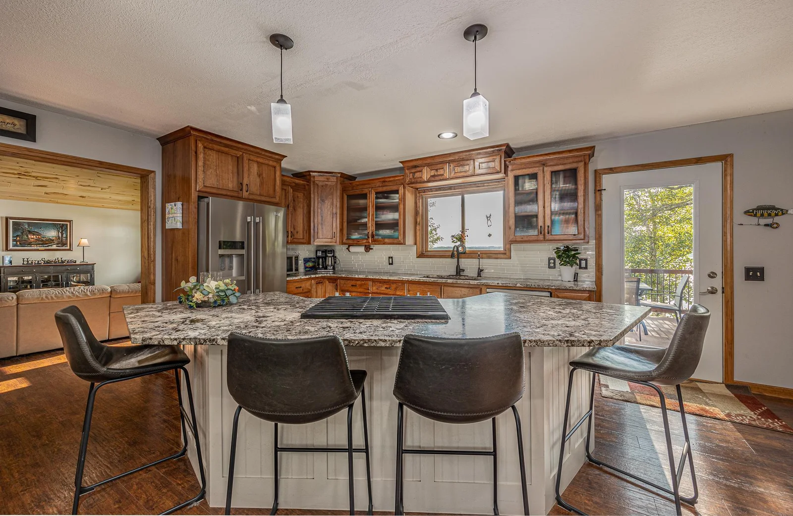 Granite countertops accent the center island.