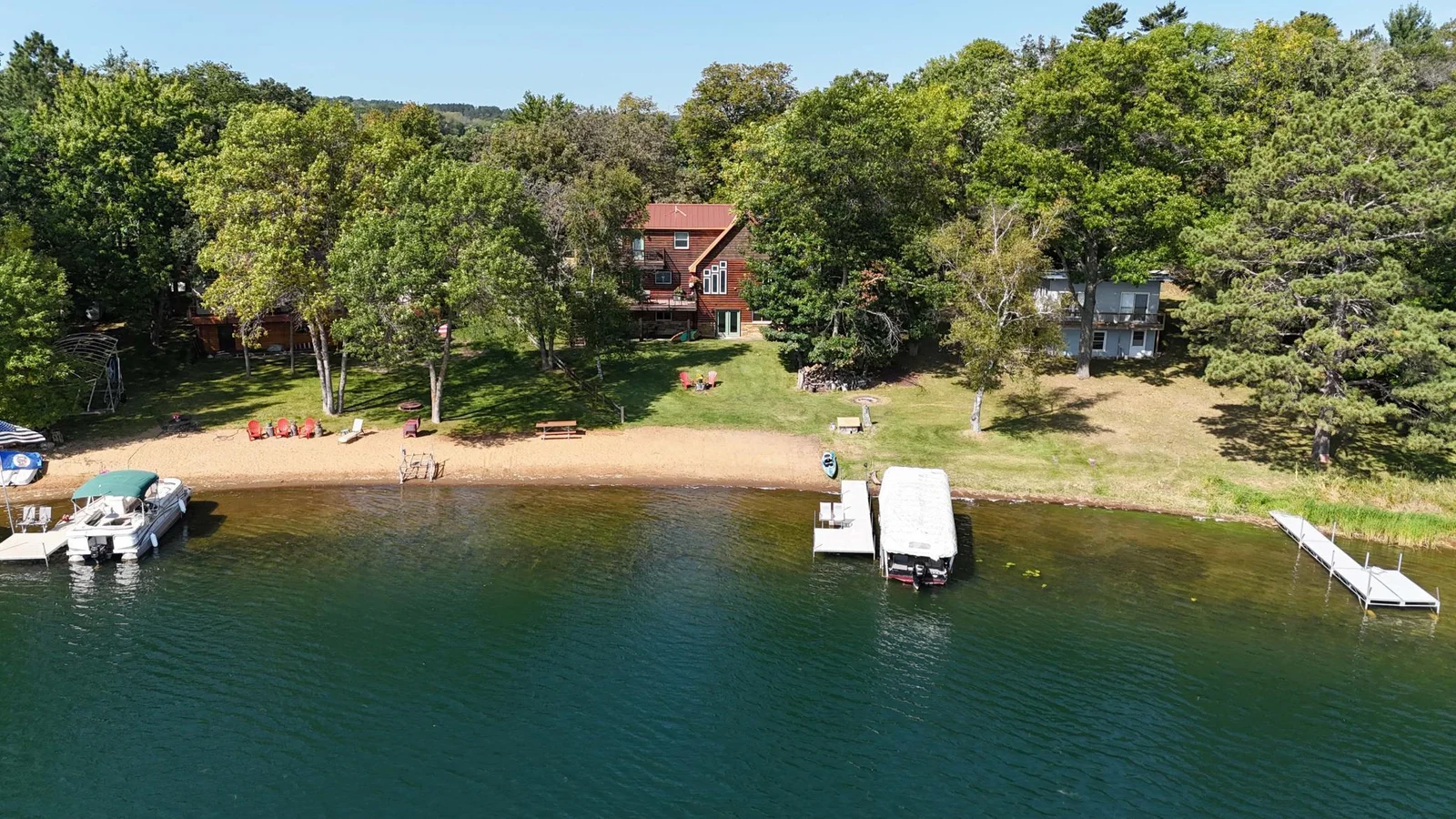 Additional view of the sandy shoreline.