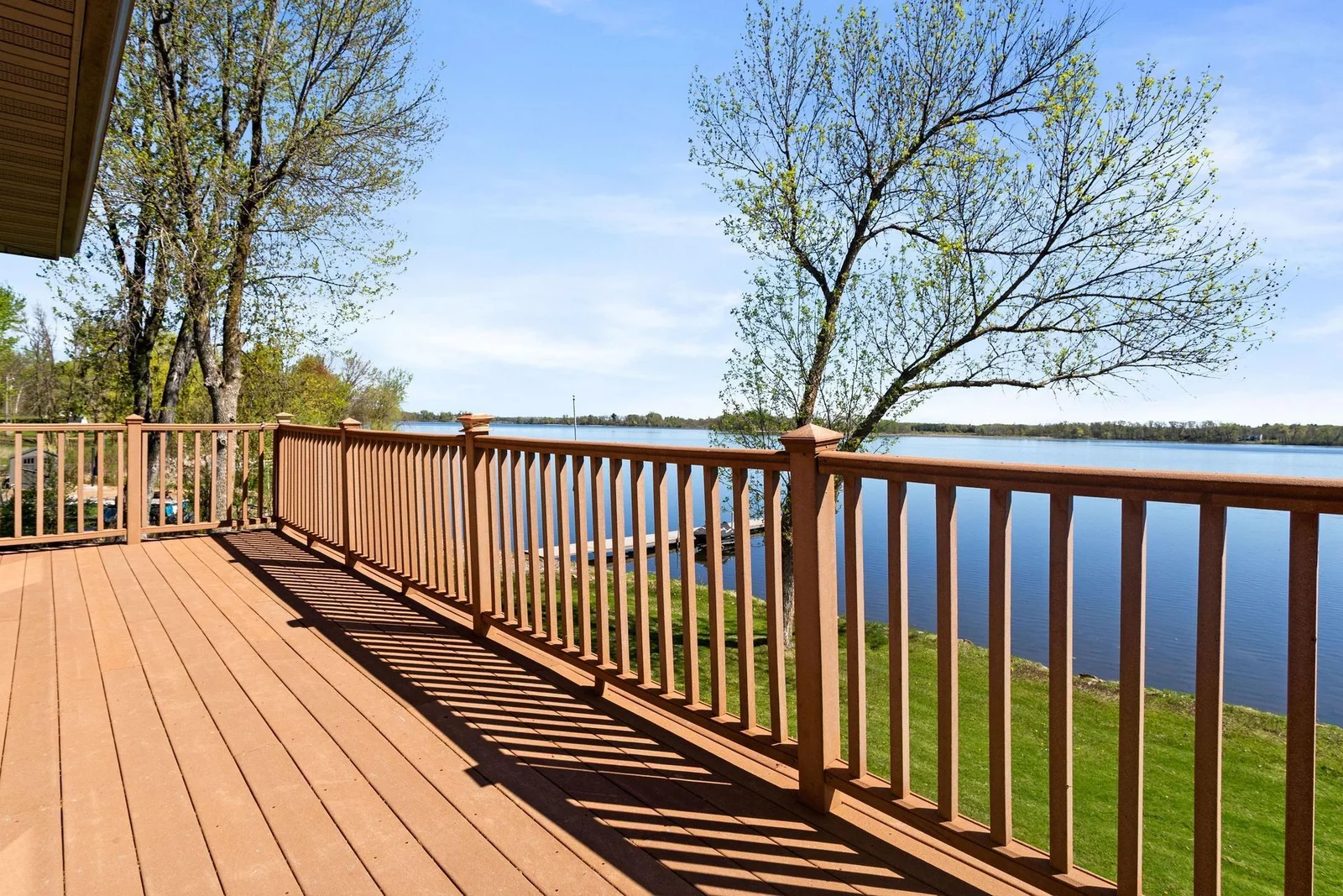 Maintenance-free deck with adjustable footings
