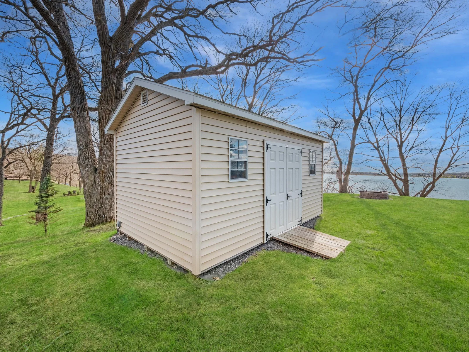 Spacious storage shed offers a convenient solution for organizing tools, lawn equipment, and seasonal items.