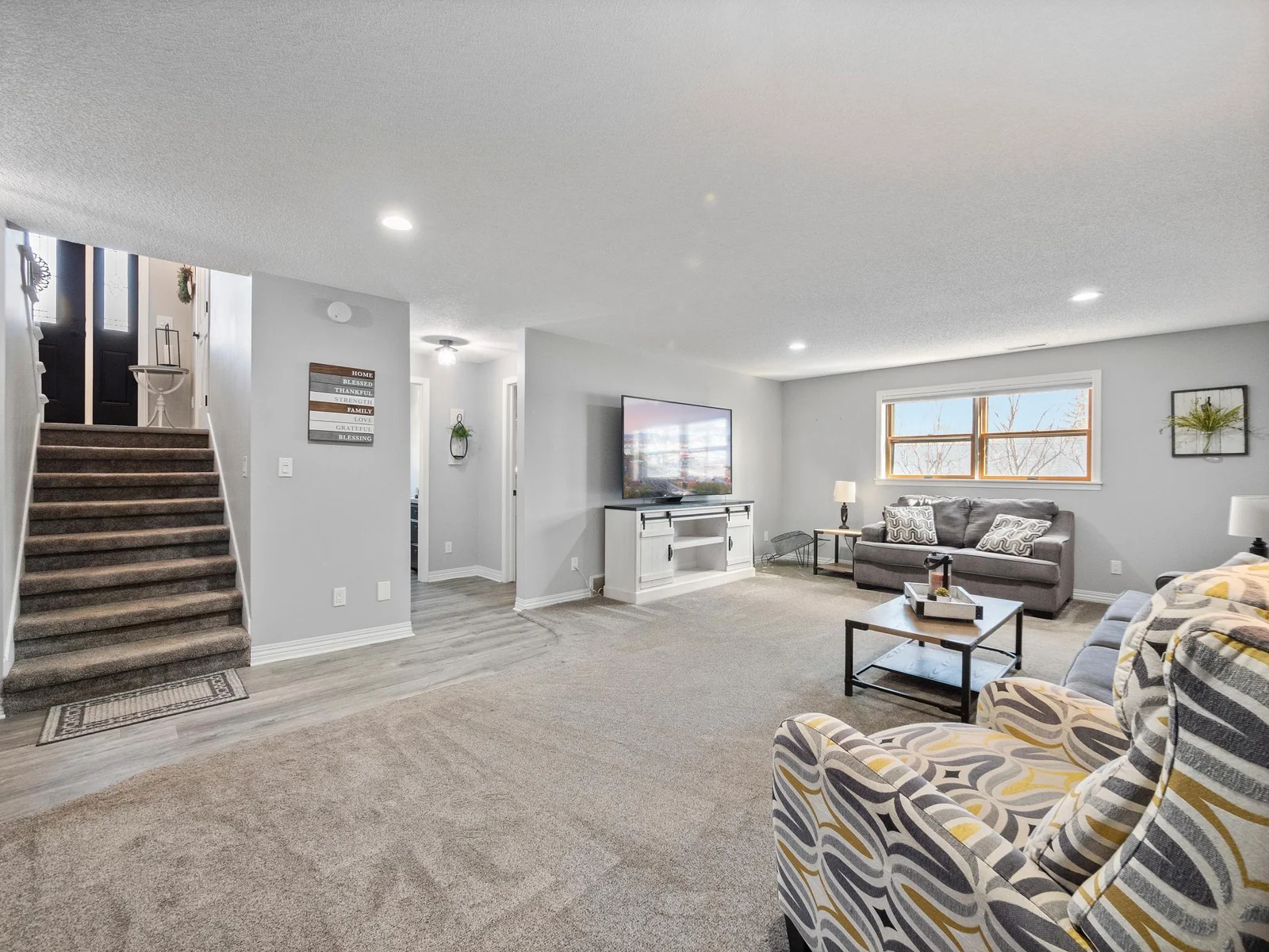 From cozy movie nights with family to lively gatherings with friends, this family room is perfect for every occasion.