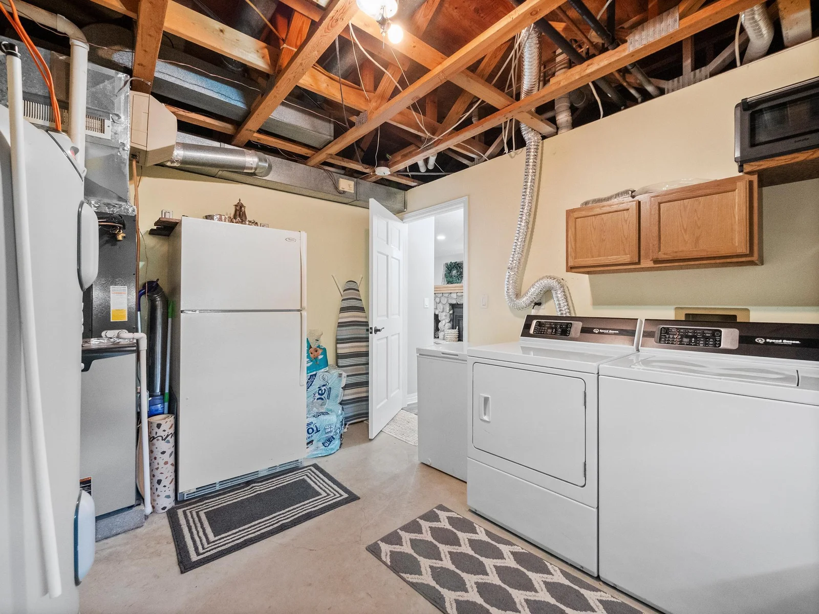 A large laundry room complete with ample storage for all your essentials.
