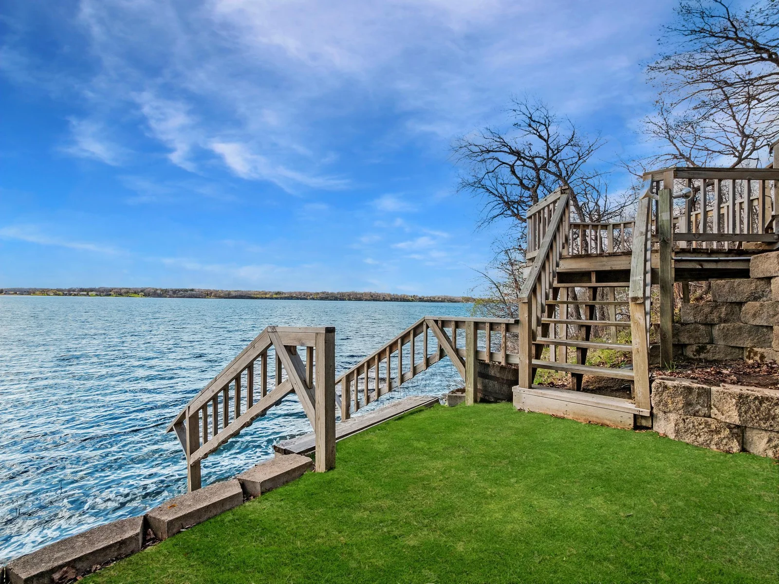 Direct access to Big Chip Lake lakeshore with a deck for lakeside viewing.