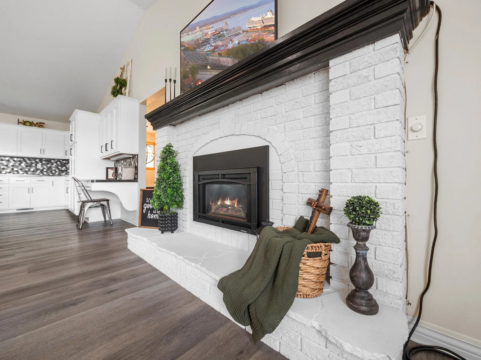 New gas fireplaces add warmth and charm to both the main floor and lower level.