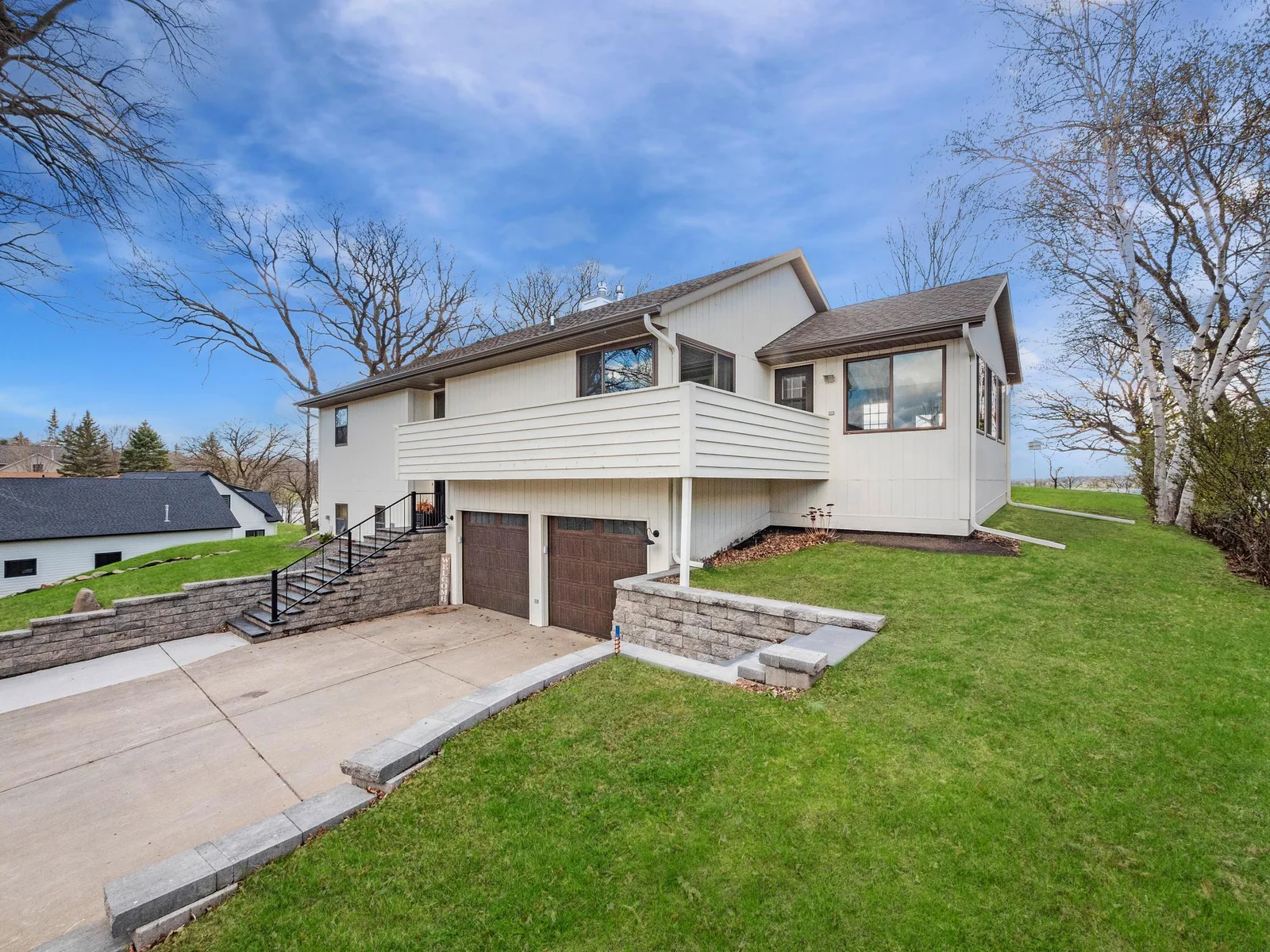 Thoughtfully renovated 3 bedroom, 2 bath home with 105 feet of pristine shoreline on the sought-after Chippewa Lake.