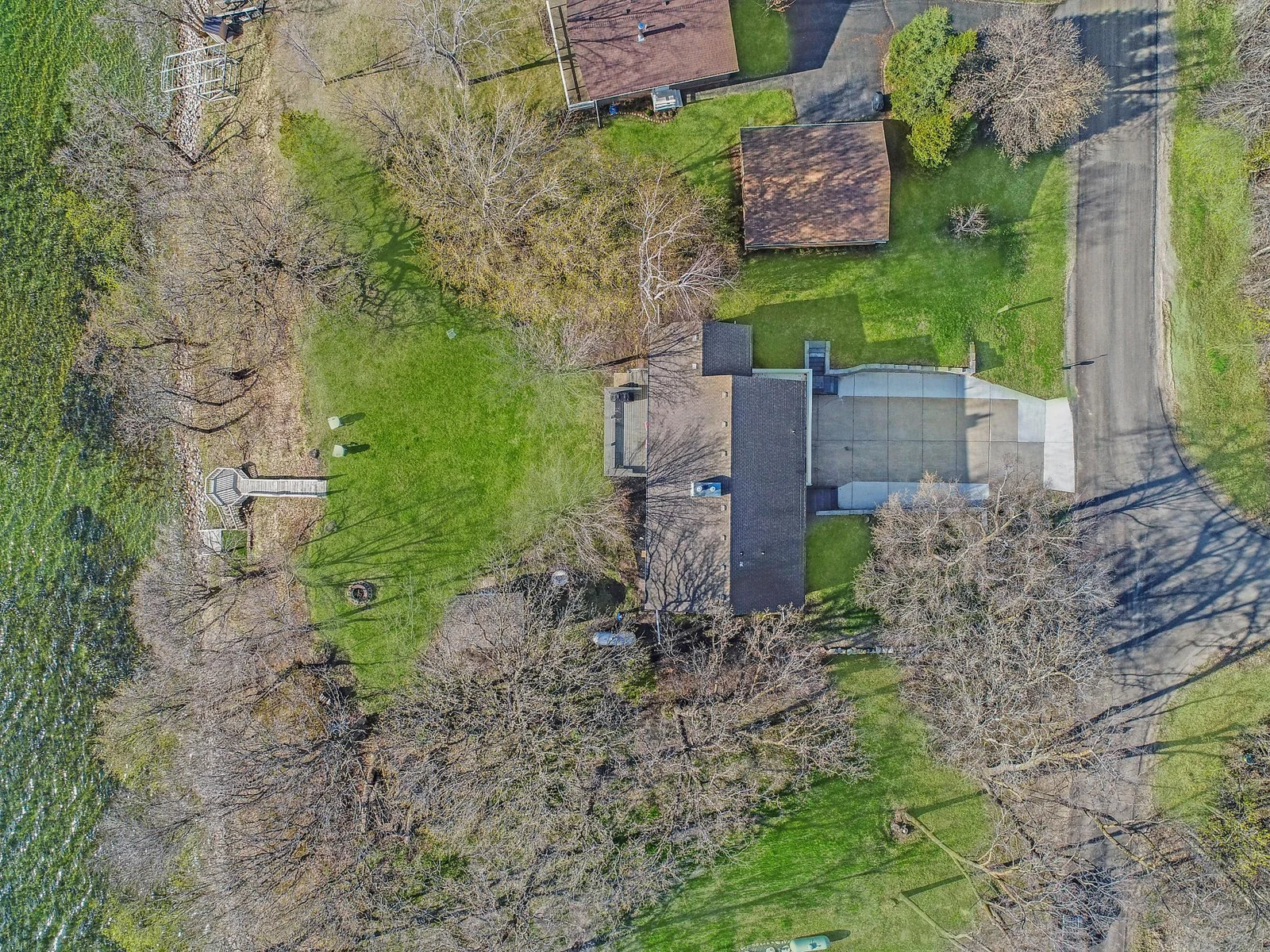 A spacious backyard ideal for grilling, hosting friends, and playing your favorite yard games.