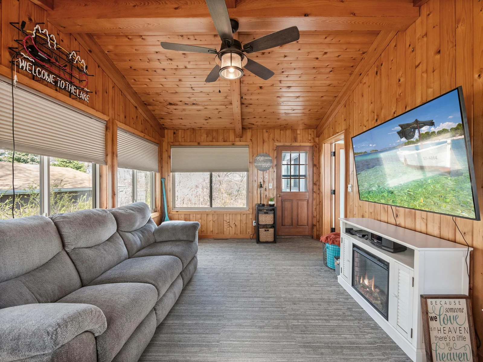 Transition into the four-season porch, ideal for relaxation.