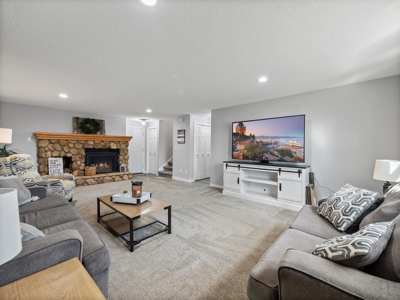 Downstairs you will find a large family room complete with a stone-accented gas fireplace.