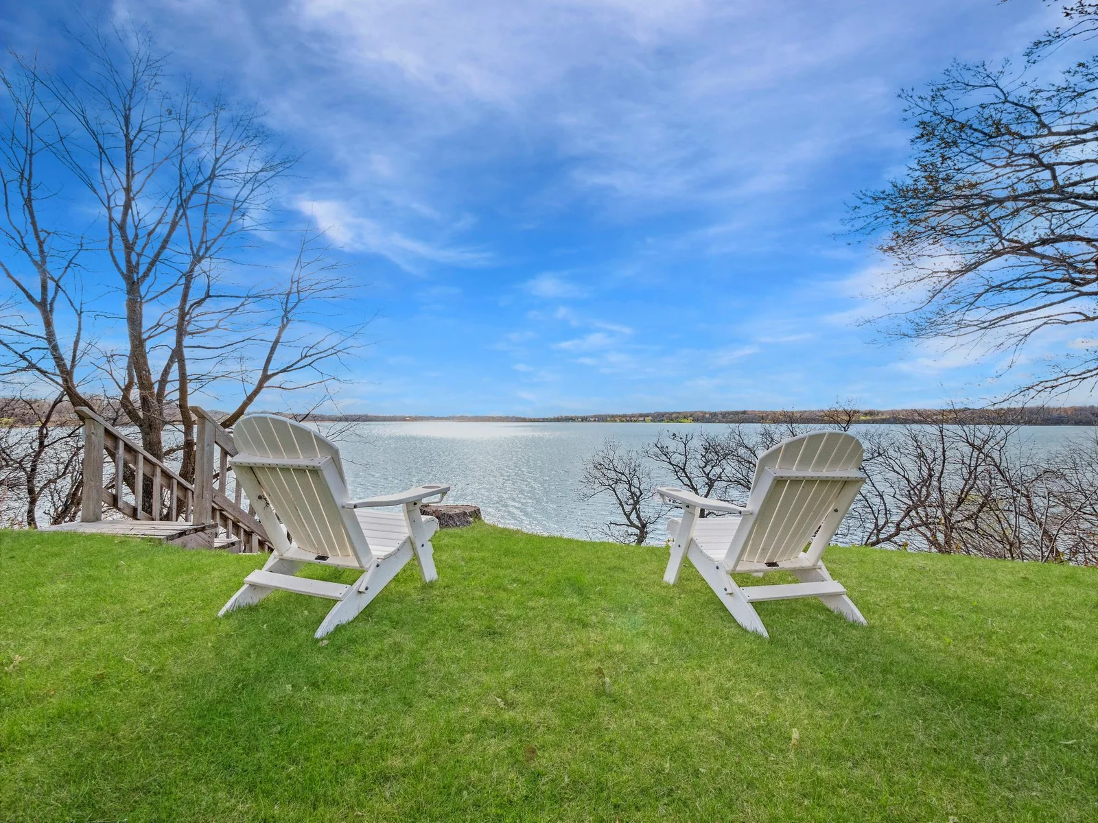 Take in serene lakeside views with ample green space perfect for outdoor activities and relaxation.