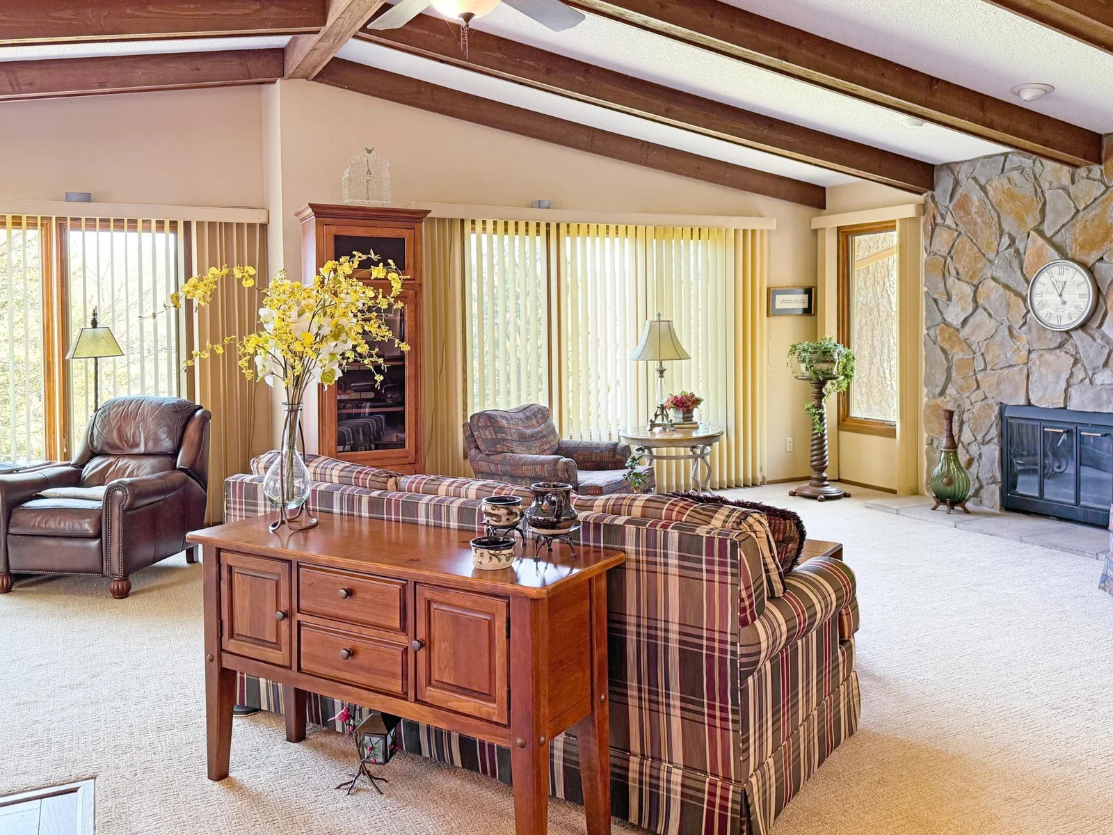 Vaulted beamed ceilings enhance the spaciousness.