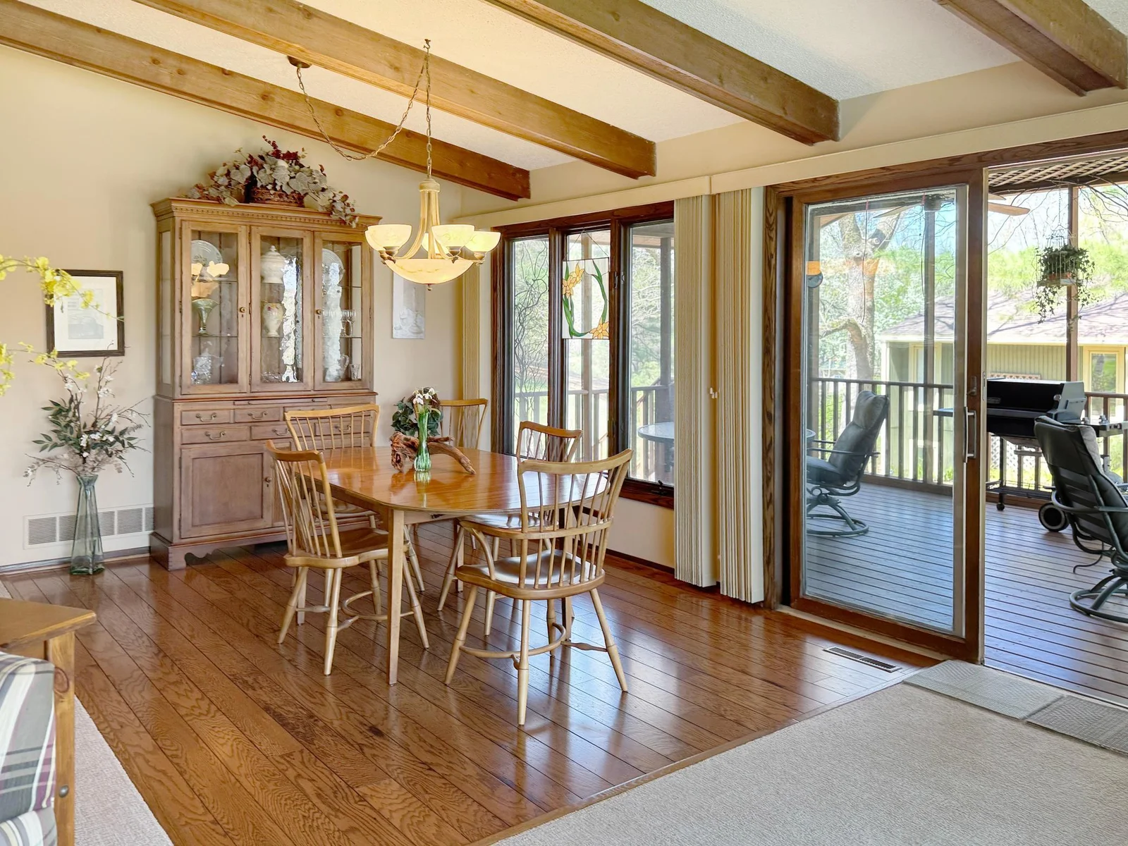 Sliding glass doors lead to the 3 season porch.
