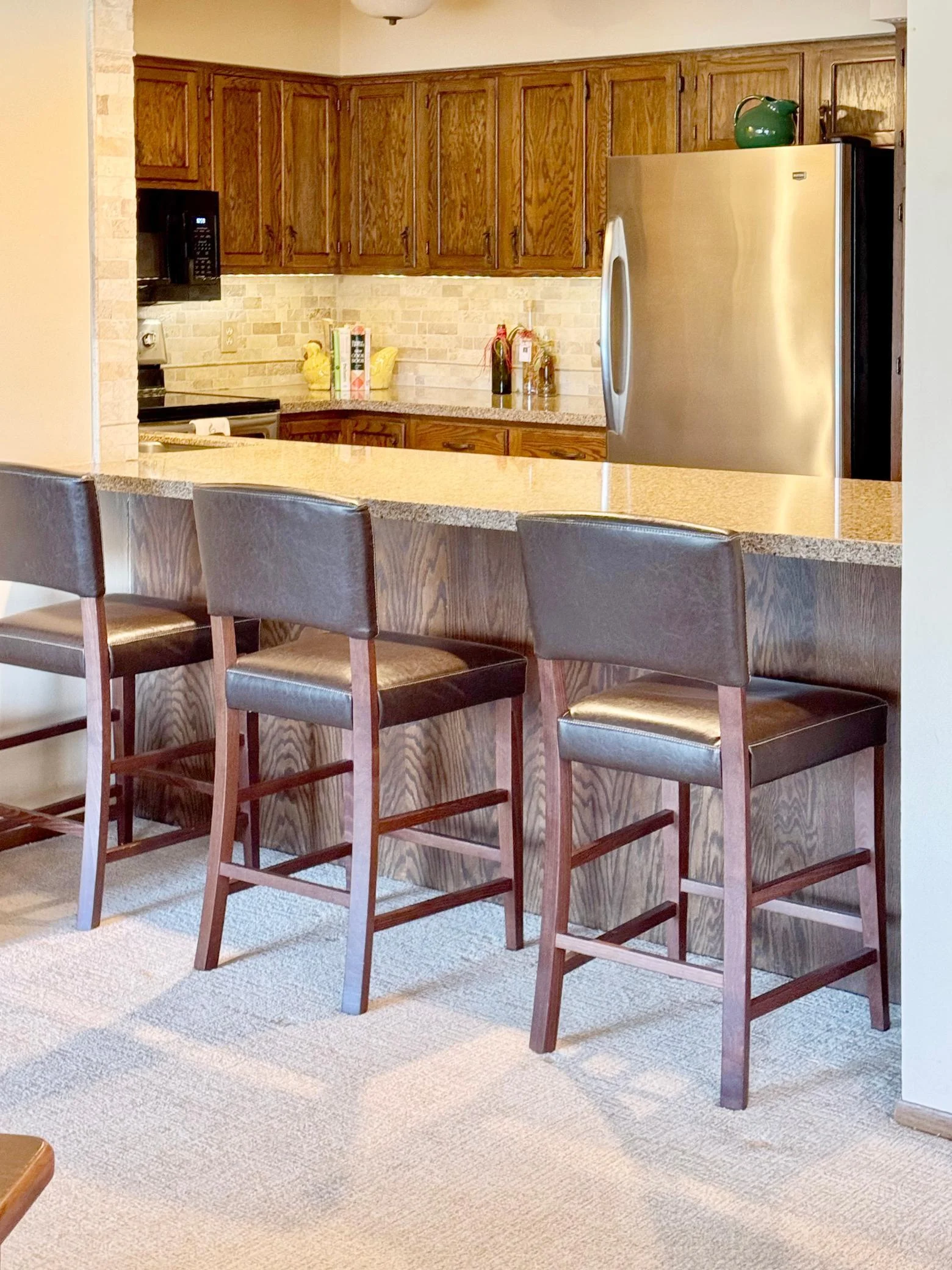 Open to the great room offers a wonderful breakfast bar.