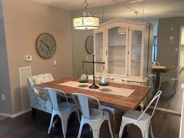 Just off the kitchen is the dining room, and