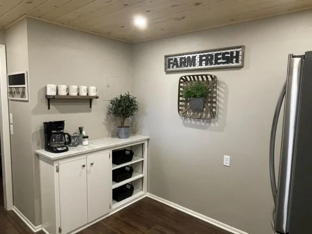 updated kitchen with new flooring,