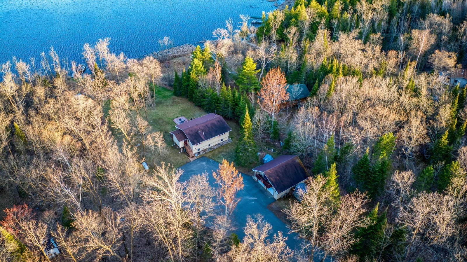 Tucked under the mature trees, offer shade and privacy
