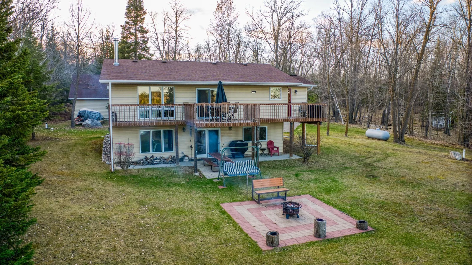 Relax on this massive deck or on your private patio facing the lake
