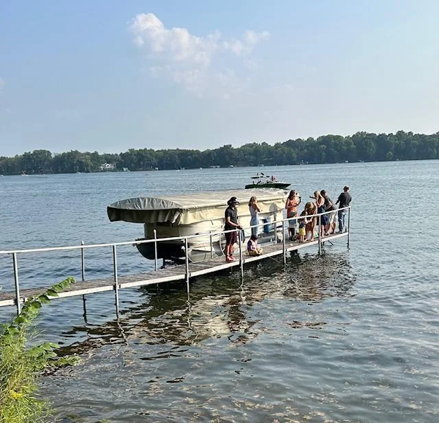 The kids fishing off the dock