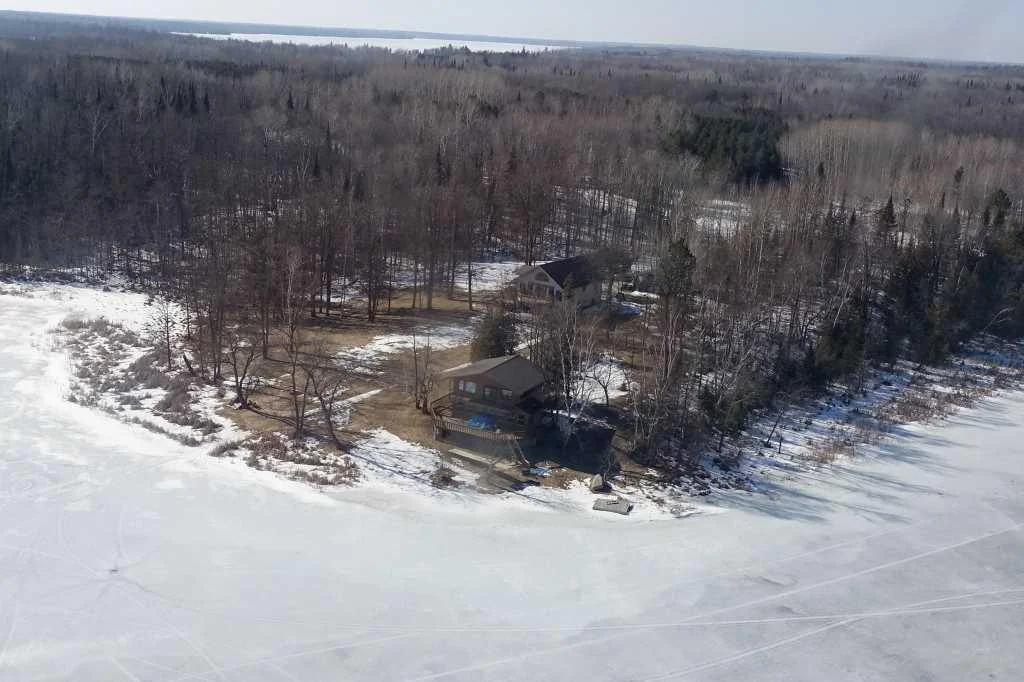 drone winter cabin shot