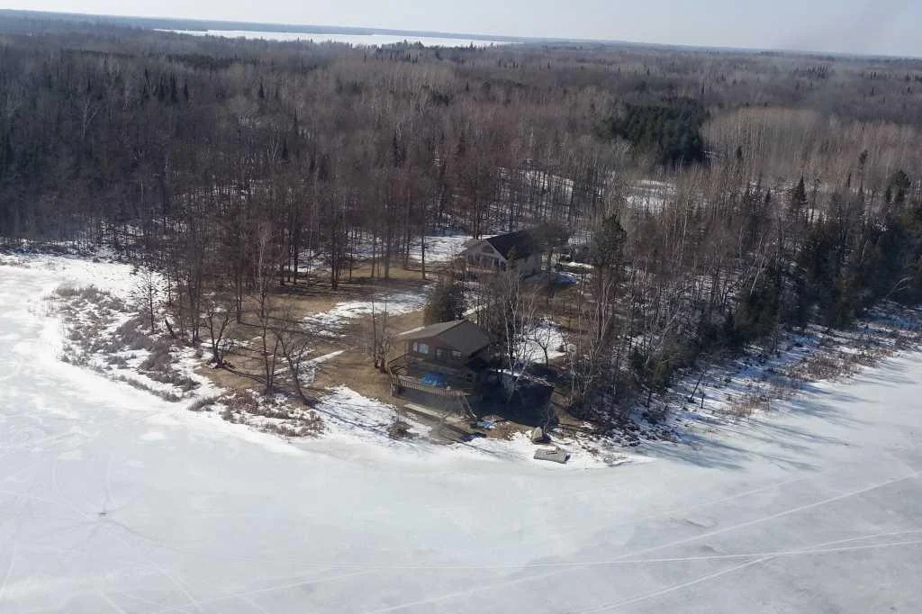 drone winter cabin shot