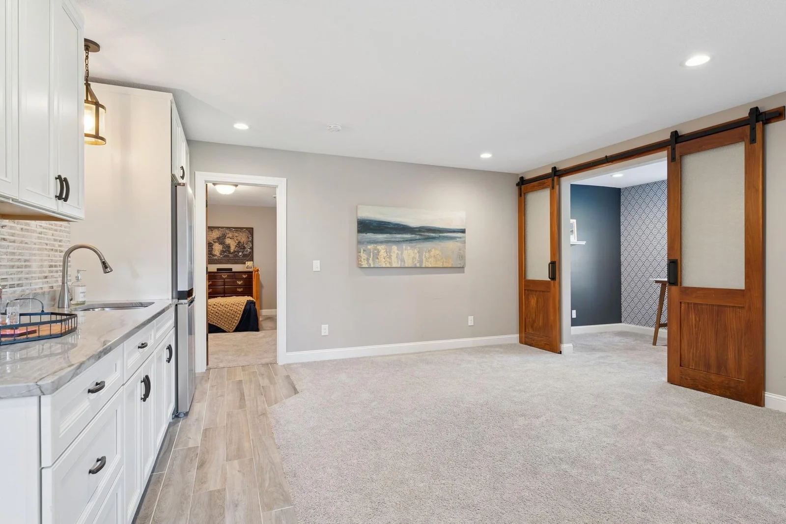 The current owners typically keep a ping pong table here. What will you put there? There is plenty of room for a pool table, exercise equipment, a dining table, a game table or whatever you prefer.