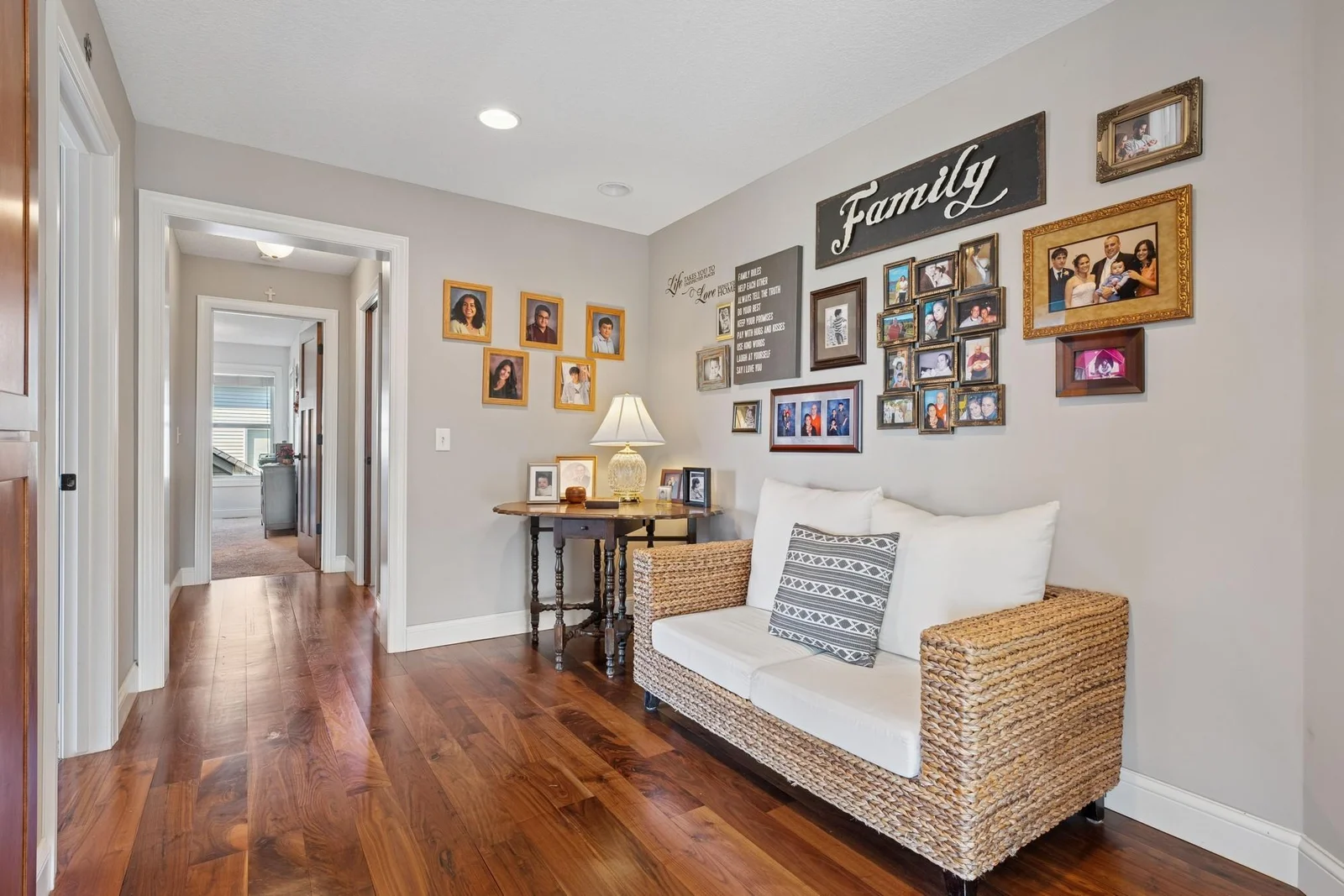 The primary suite encompasses the rear side of the home, while the other three bedrooms cover the front.