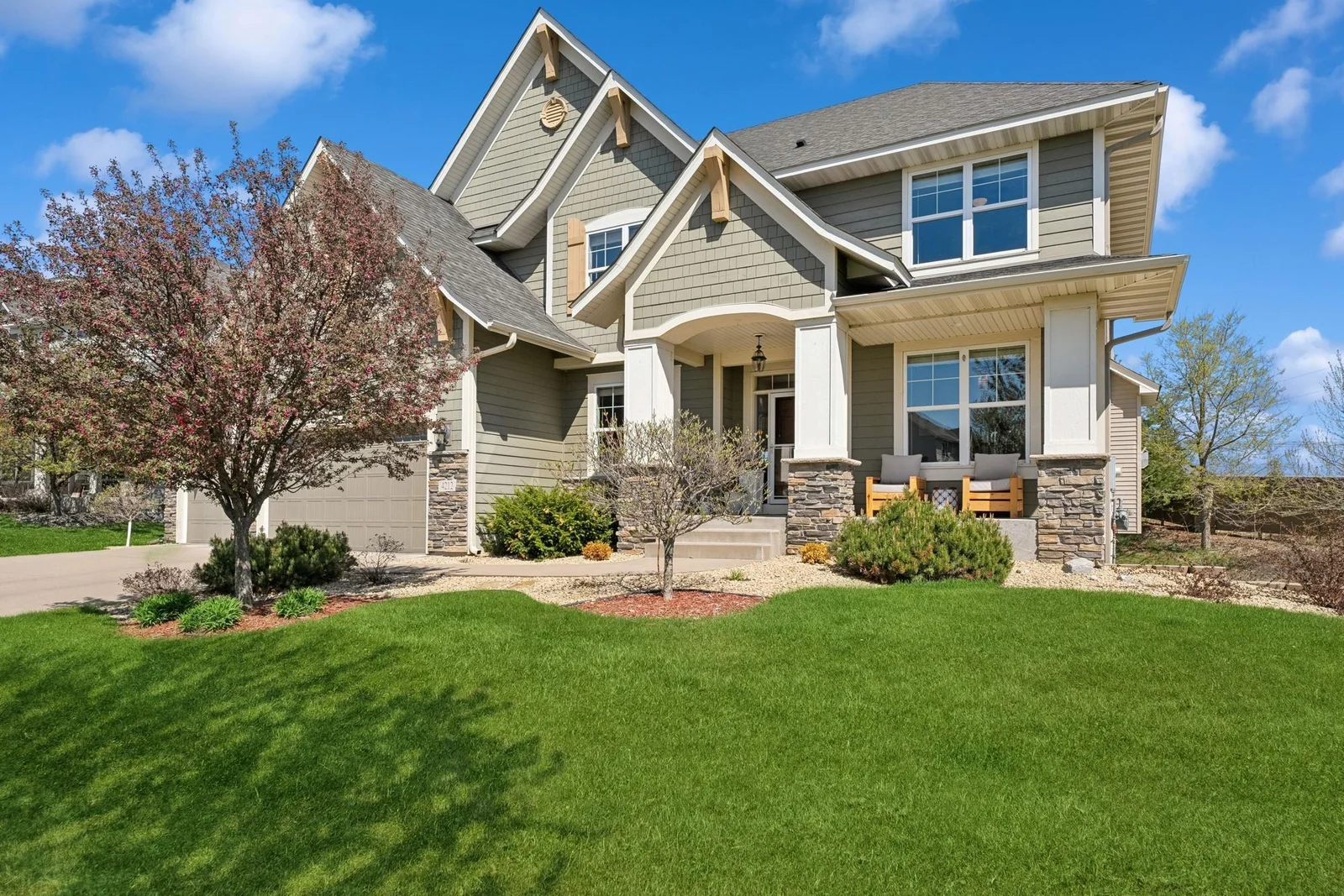 The front landscape is impeccably maintained, but tasteful and simple to care for. The home has gutters & downspouts all around, and the covered front porch is such a great place to say hi to the neighbors!