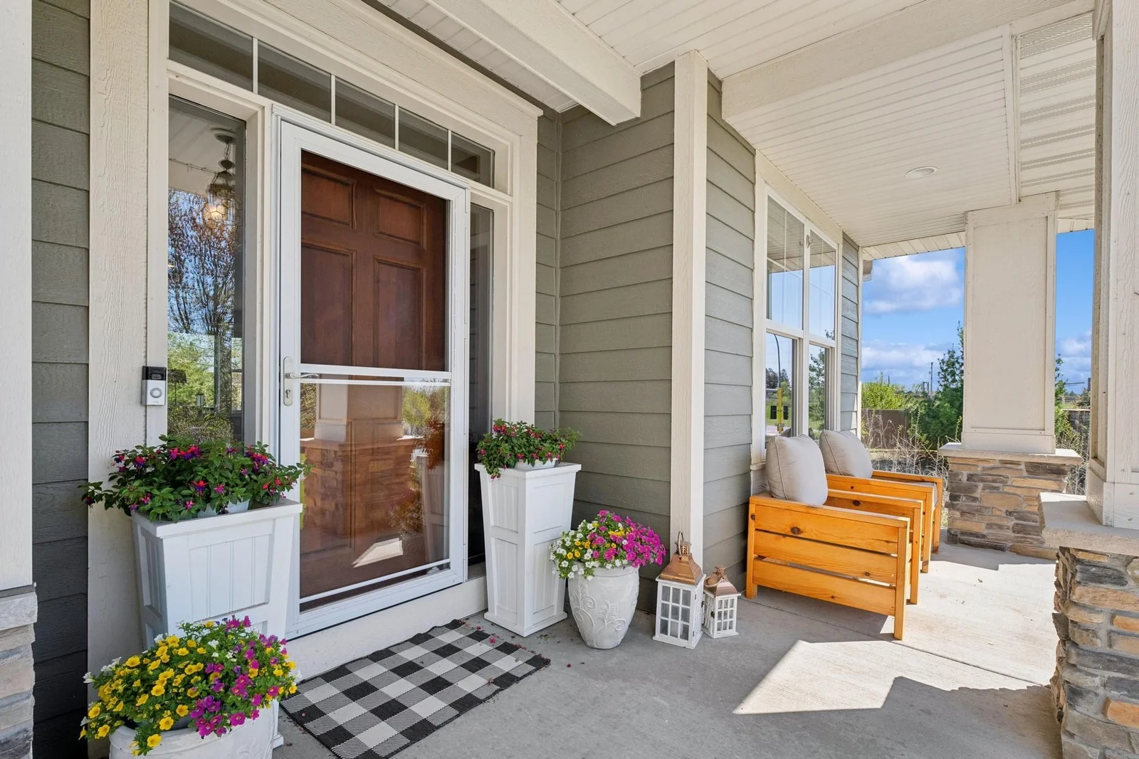 While your guests wait for you to answer the Ring video doorbell & come to the door, they won't get rained on. Let the breeze roll in through the full-light Andersen screen/storm door.