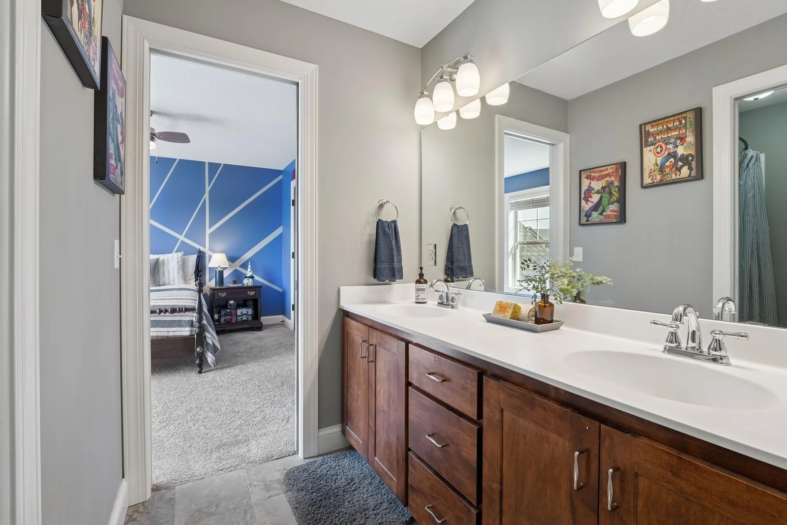 Here is the dual sink vanity in the Jack & Jill bath. There is a bathtub with a tiled shower surround too!