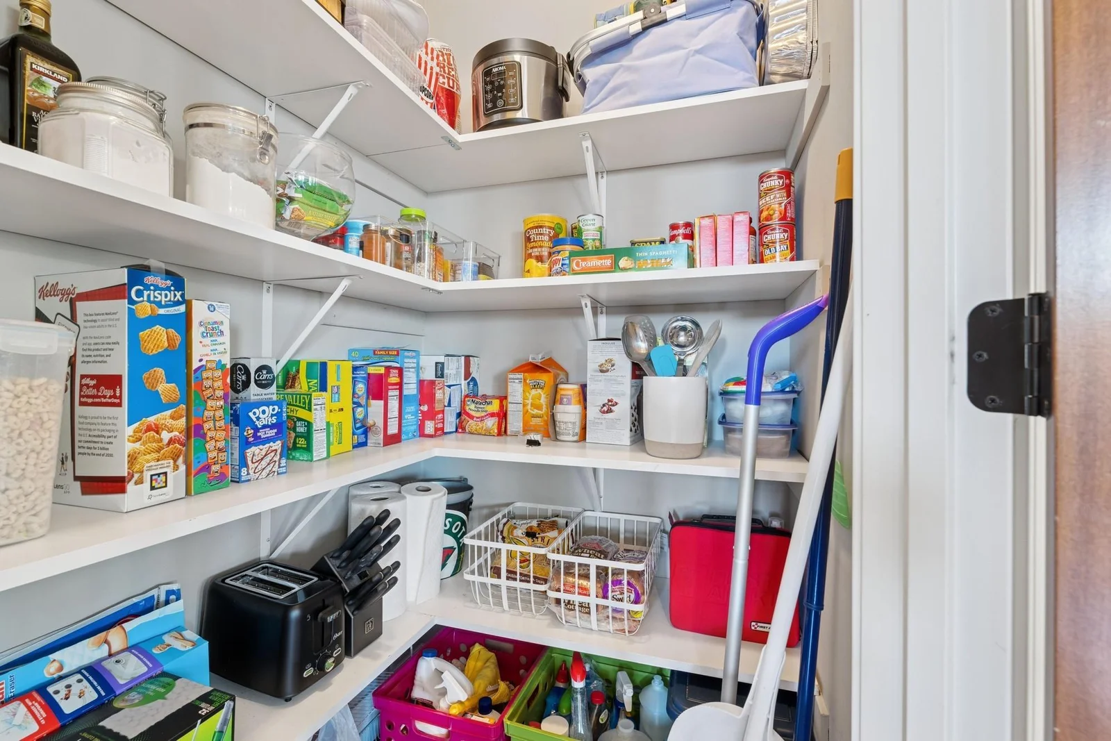 In case somehow there isn't enough space in the cabinets, there is a huge walk-in pantry too!