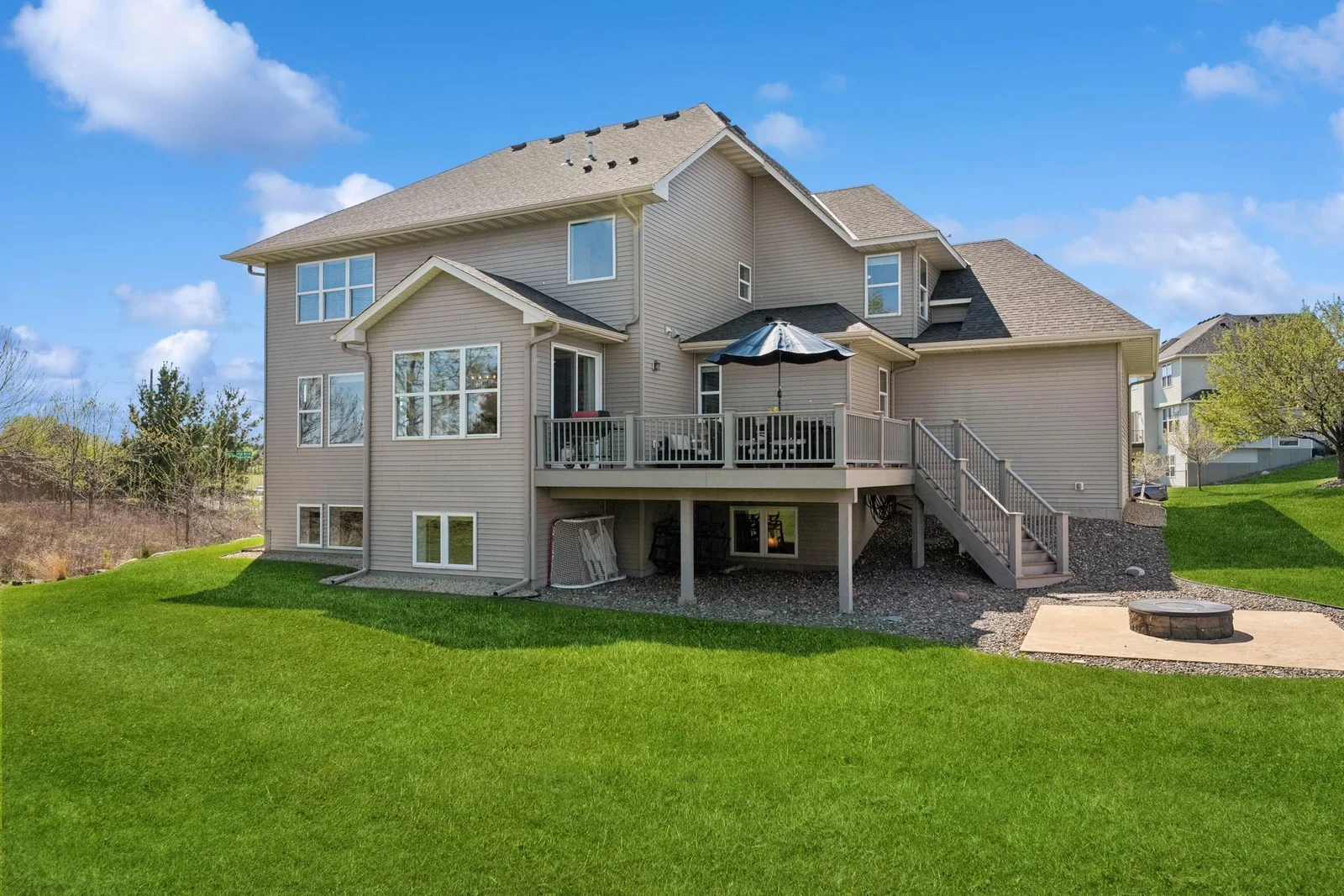 How nice would it be to have no neighbors to the south, especially when its nice and sunny? And because the deck is on the east side of the home, it'll be shaded & cool on hot Summer afternoons.
