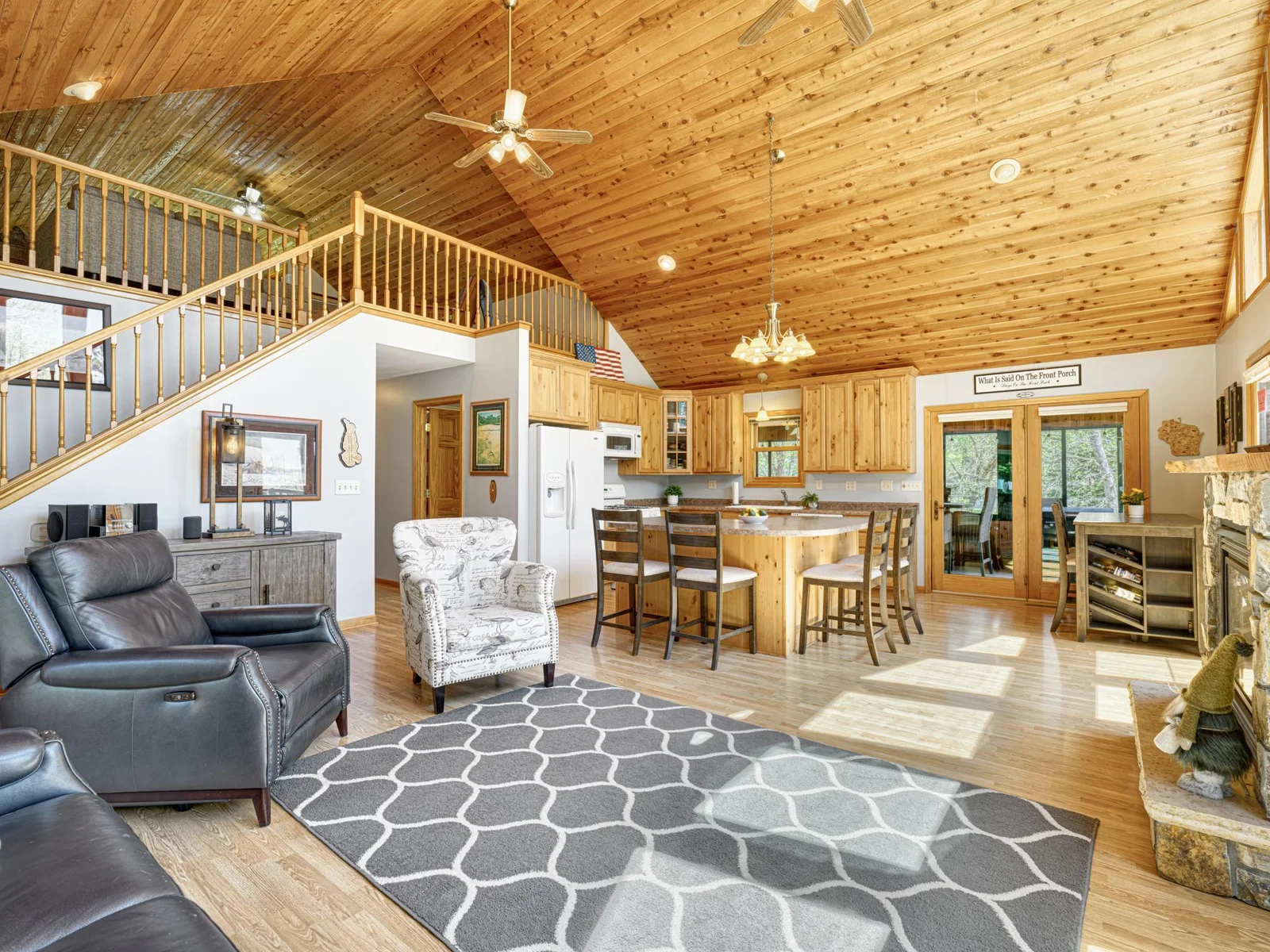 Drenched in natural light, the room awaits your lakeside gatherings.