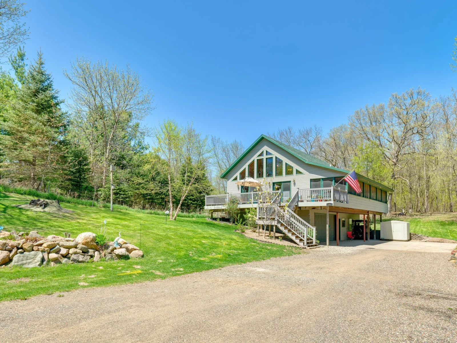1 - House features plenty of parking for lakeside visitors.