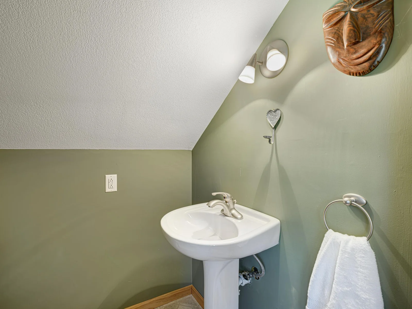 The half bath nicely services the loft space.