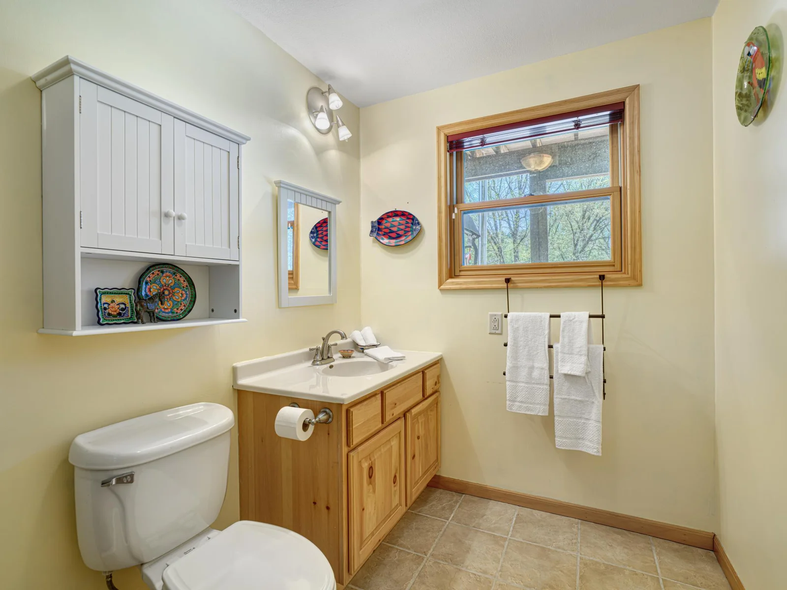 Lower level 3/4 bathroom features tile floors with in-floor heating.