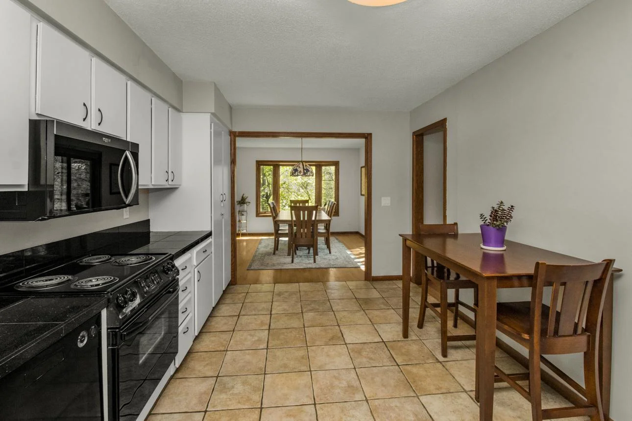 Kitchen has tons of space and adjoins the formal dining room - or four season porch!