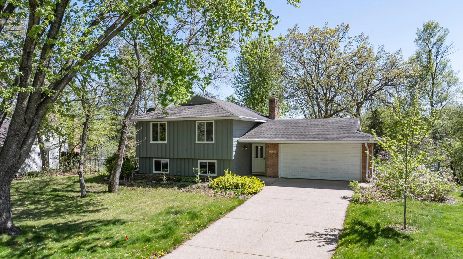 Welcome Home!  Heavily wooded lakefront home in Apple Valley!  Three bedrooms, two full baths, two car garage and fully fenced yard!