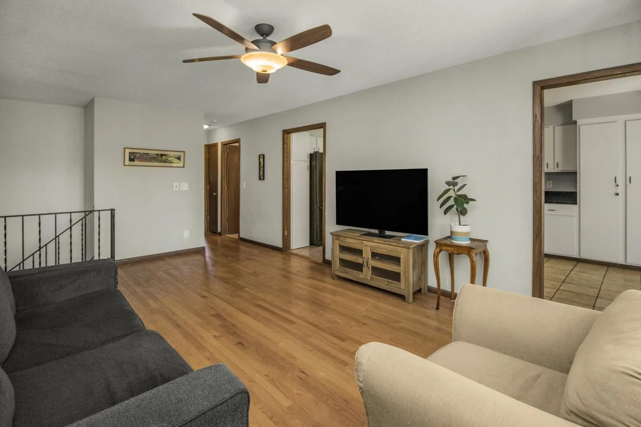 Beautiful hardwood floors in this living room!  Plenty of space and great flow through kitchen.
