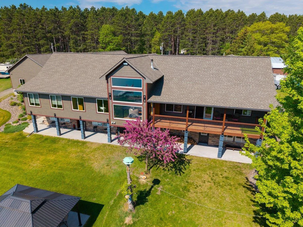 Large windows optimize lake life views no matter what the weather is like