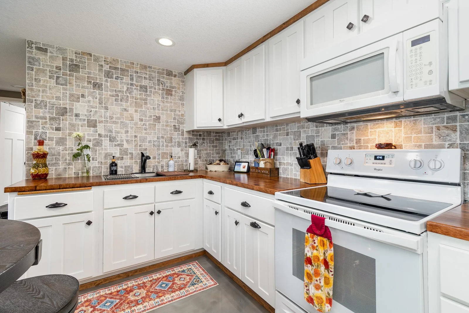 Custom concrete counters in kitchen and bathroom