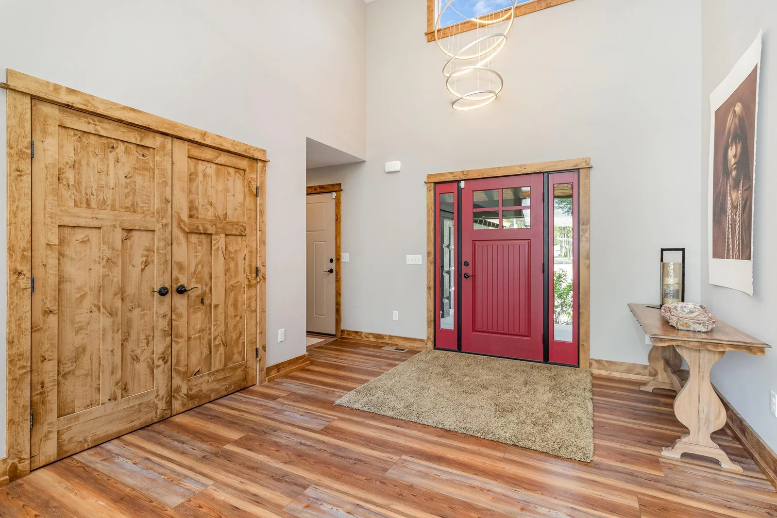 Grand entry with custom built locker storage and closet. Inside the closet is a light switch to turn on and off Christmas lights