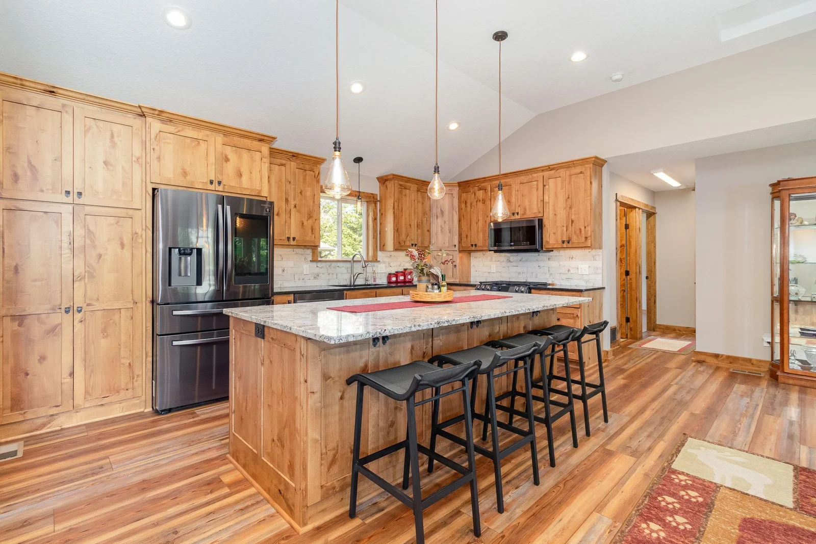Custom knotty alder cabinets with soft close