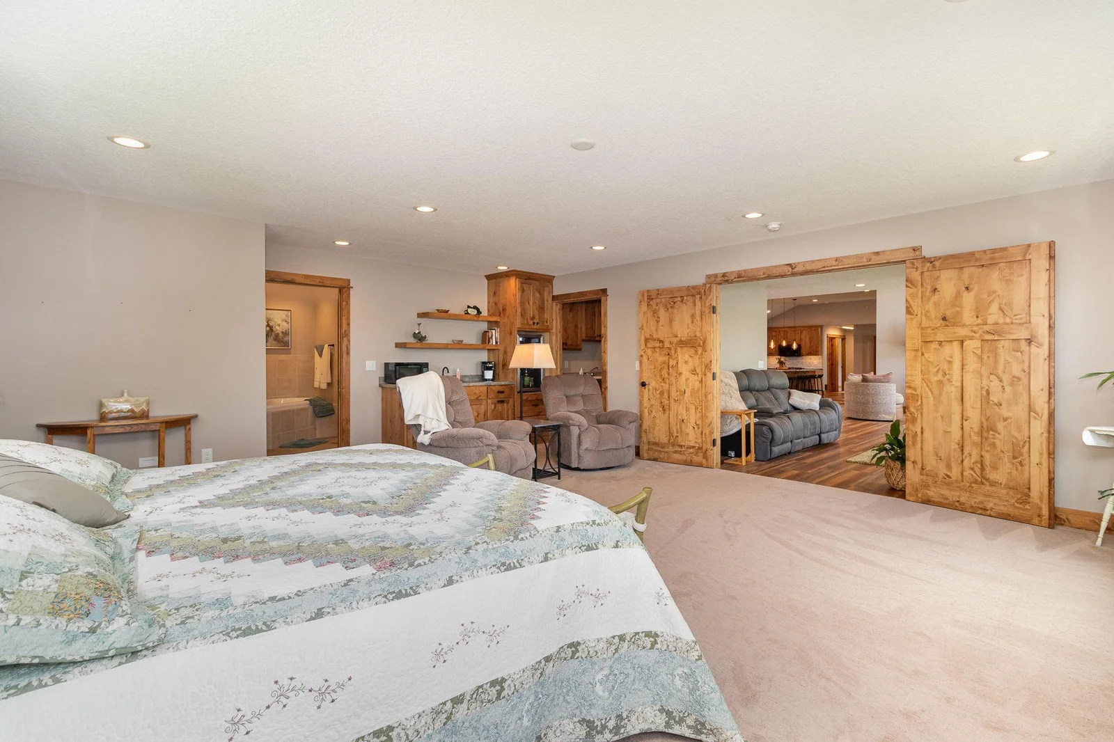 Wet bar in the primary bedroom is perfect for late night snacks in your own private retreat area